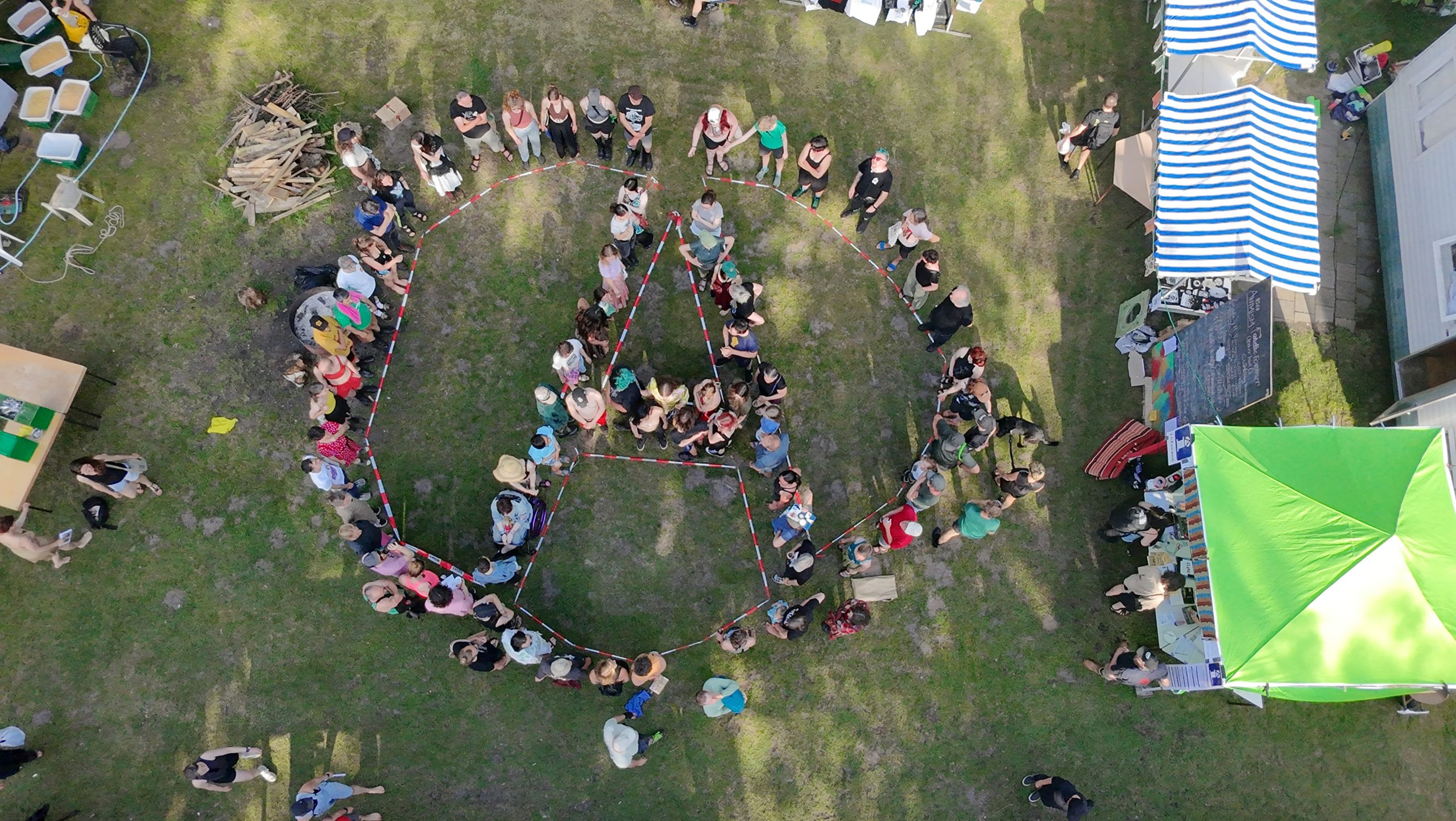 aerial photo of people forming the circled A at PL26